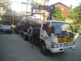 Эвакуация манипулятором по городу